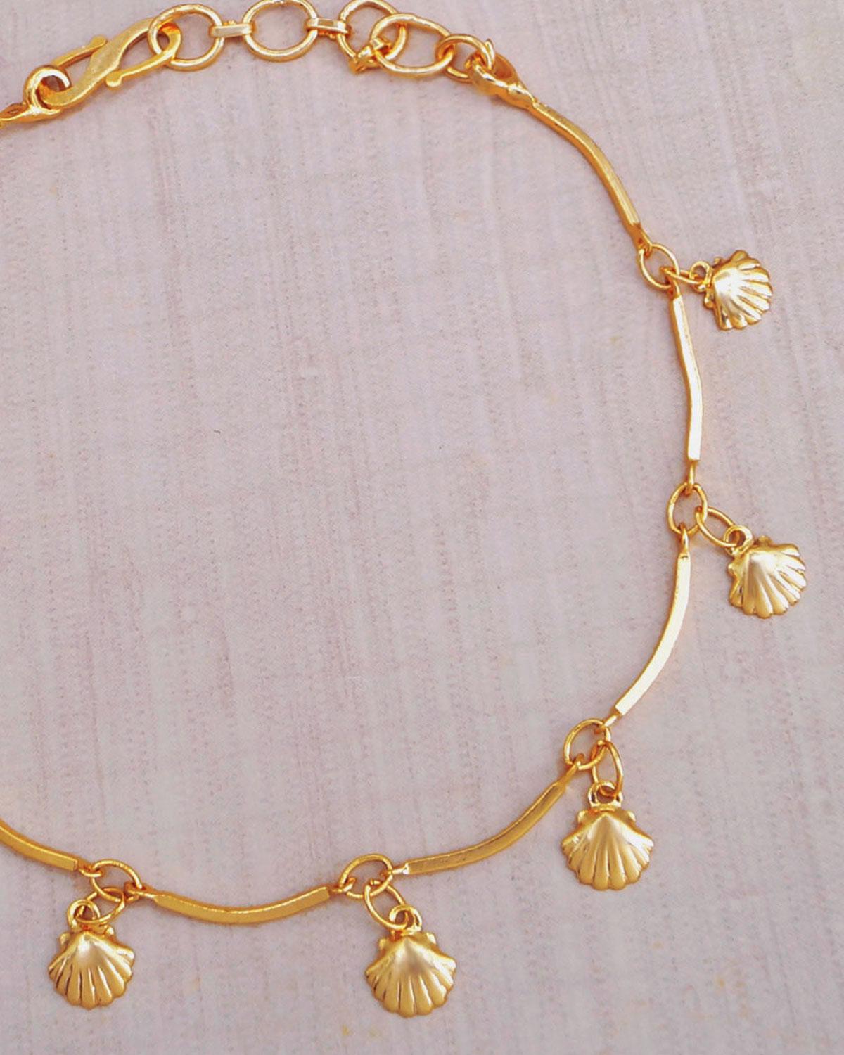 Latest Gold Collection Bracelet Design With Golden Sea Shells Hanging In The Bracelet